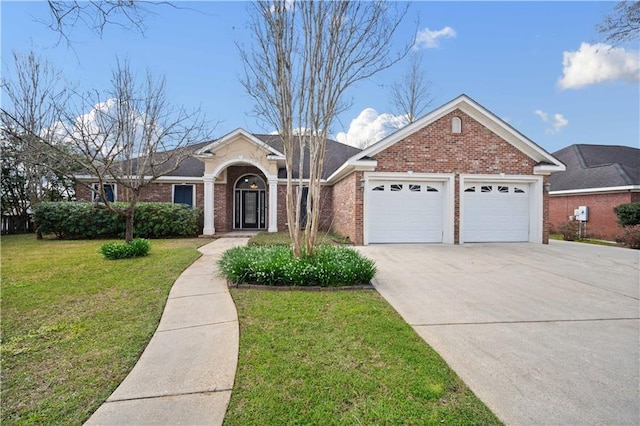 ranch-style house with a garage, brick siding, concrete driveway, and a front yard