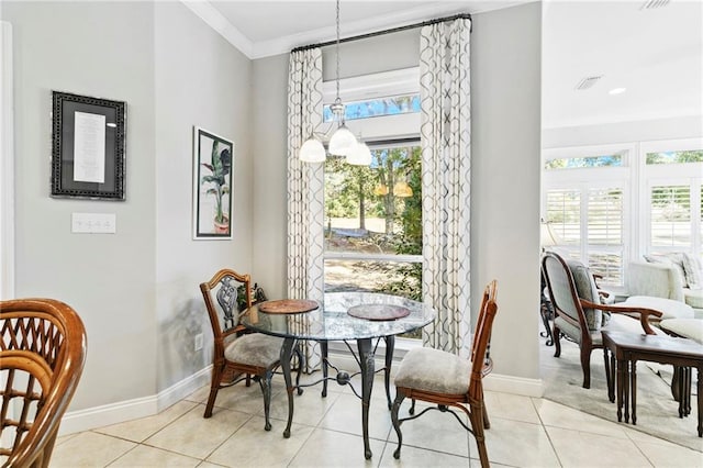 tiled dining space with ornamental molding