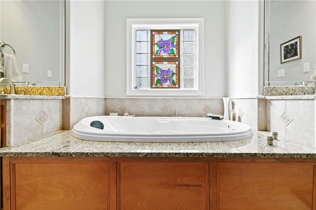 bathroom featuring a tub to relax in