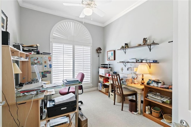 home office featuring ceiling fan, light colored carpet, and ornamental molding