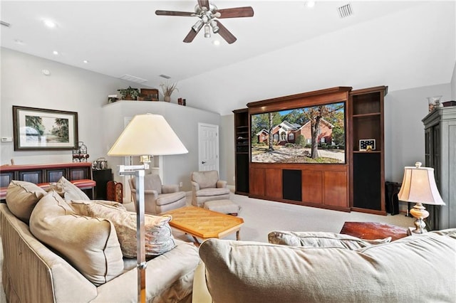 carpeted living room featuring vaulted ceiling and ceiling fan