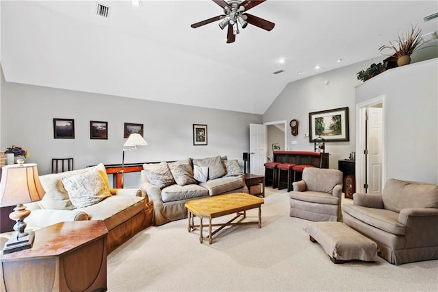 living room with ceiling fan, light colored carpet, and lofted ceiling