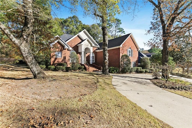 front facade with a front lawn