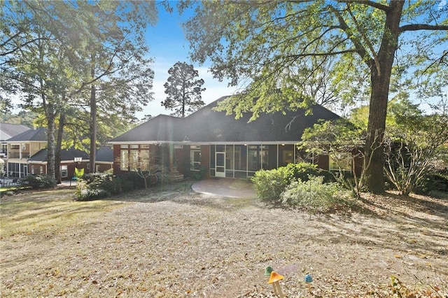 rear view of property with a patio