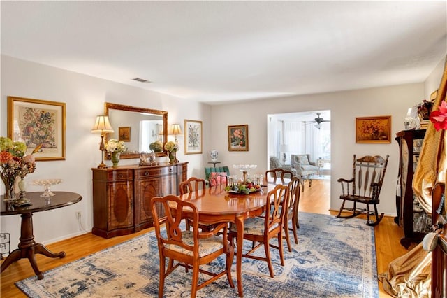 dining area with light hardwood / wood-style flooring