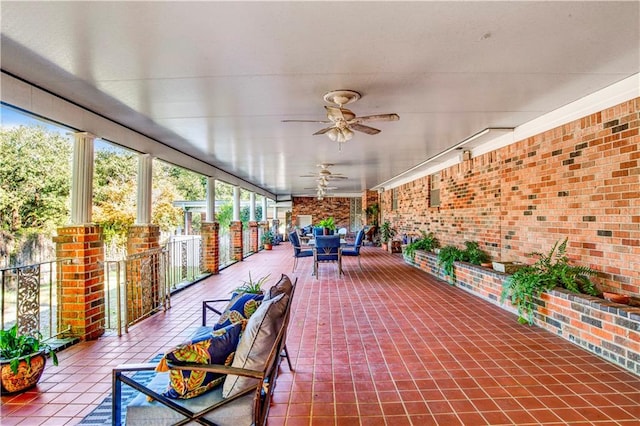 view of patio featuring ceiling fan