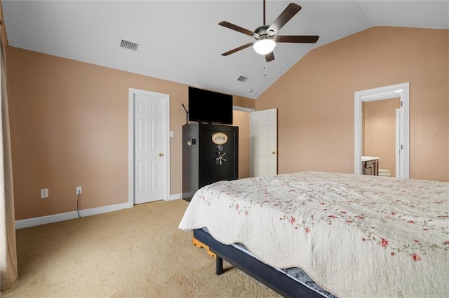 carpeted bedroom featuring ceiling fan and vaulted ceiling