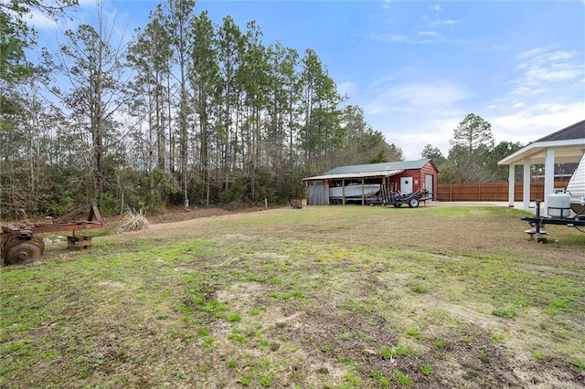 view of yard featuring a carport