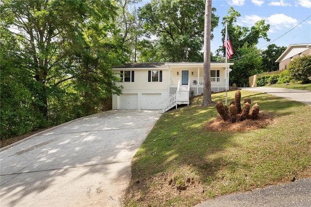 ranch-style house with a porch, a garage, driveway, a front yard, and stairs