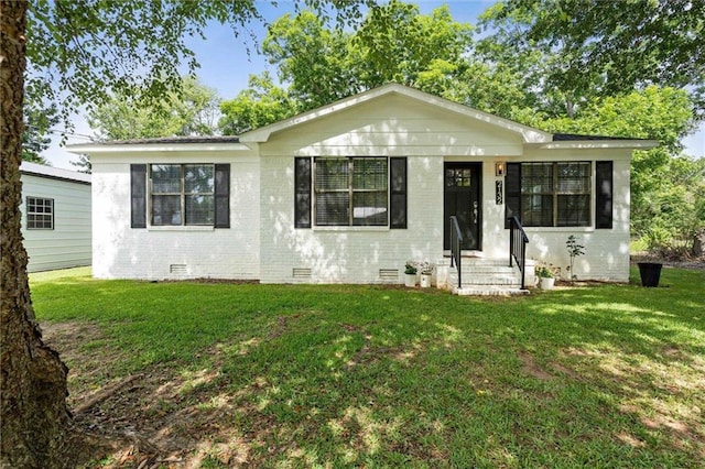 2132 Pine St S, Loxley, AL 36551 - view of front of house with crawl space, a front lawn, brick siding, and entry steps