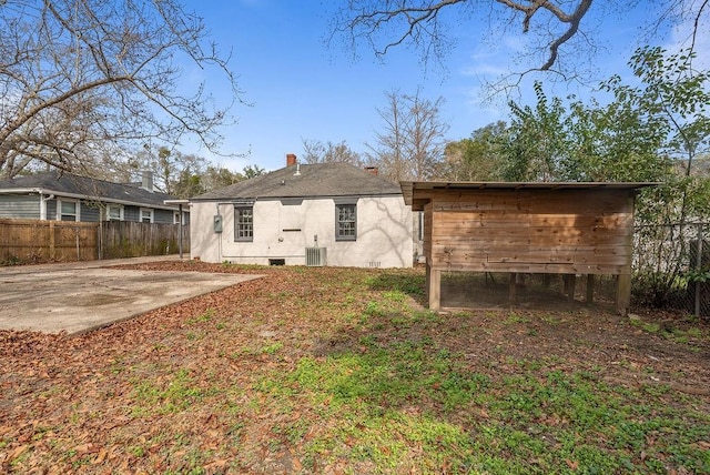 back of property featuring a patio area and central air condition unit