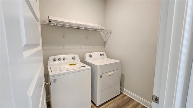 2295 Nadine Ln, Mobile, AL 36695 - laundry area with washing machine and dryer and wood finished floors