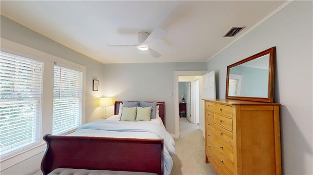 21 Crenshaw St, Mobile, AL 36606 - bedroom featuring light carpet, ornamental molding, and ceiling fan