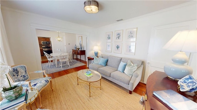 21 Crenshaw St, Mobile, AL 36606 - living room with wood finished floors and ornamental molding