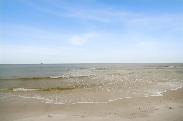 property view of water featuring a beach view