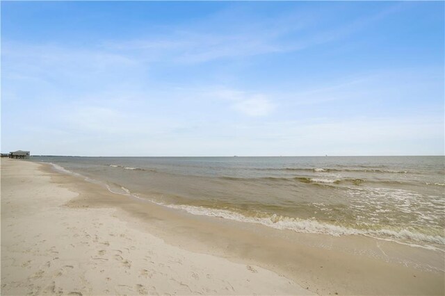 view of water feature featuring a beach view