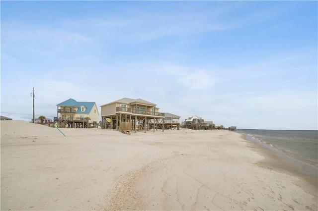 exterior space with a beach view