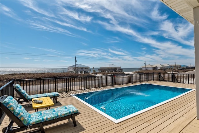 view of pool featuring a wooden deck and a fenced in pool