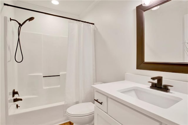 full bathroom featuring vanity, shower / bath combination with curtain, and toilet