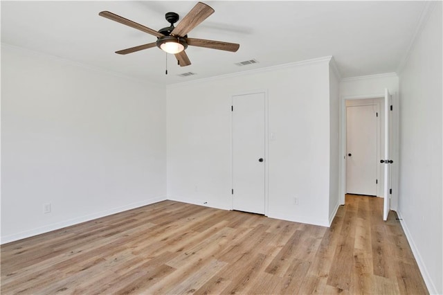 unfurnished bedroom featuring crown molding, light hardwood / wood-style floors, and ceiling fan