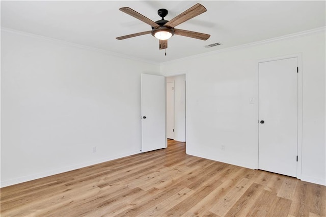 unfurnished bedroom with crown molding, light hardwood / wood-style flooring, and ceiling fan