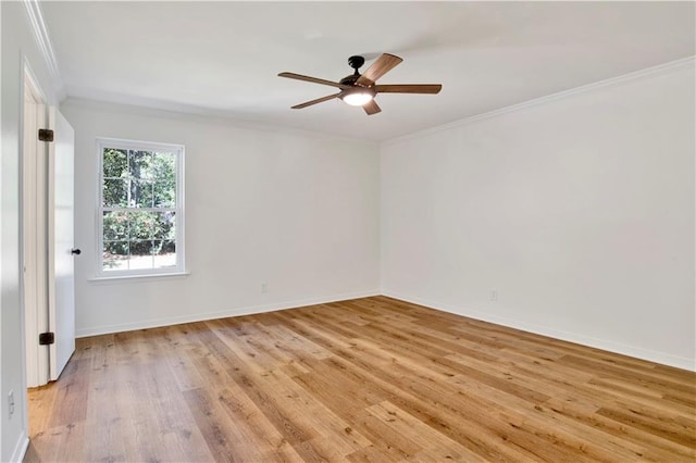 unfurnished room featuring crown molding, ceiling fan, and light hardwood / wood-style flooring