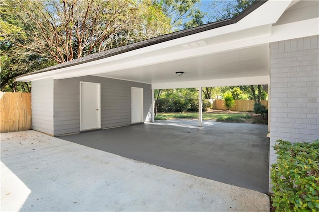 garage featuring a carport