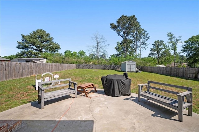 9412 Fox Hunter Ct, Semmes, AL 36575 - view of patio / terrace featuring a fenced backyard, an outdoor structure, and a shed