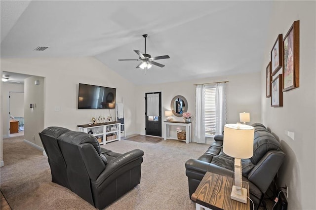 9412 Fox Hunter Ct, Semmes, AL 36575 - carpeted living room with lofted ceiling, visible vents, baseboards, and ceiling fan