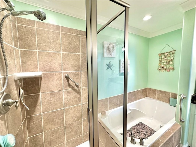 full bath with a stall shower, a garden tub, and crown molding