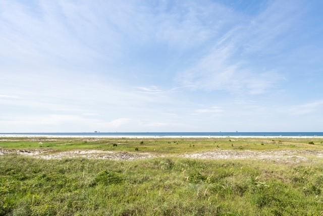 view of water feature with a beach view