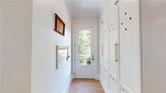 140E Mcgregor Ave S, Mobile, AL 36608 - doorway featuring light wood finished floors and baseboards