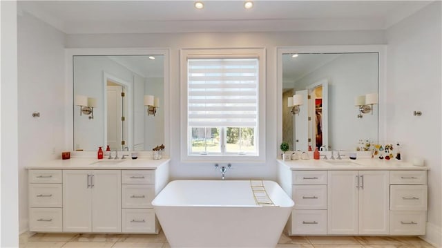 140E Mcgregor Ave S, Mobile, AL 36608 - bathroom with a freestanding tub, two vanities, and recessed lighting