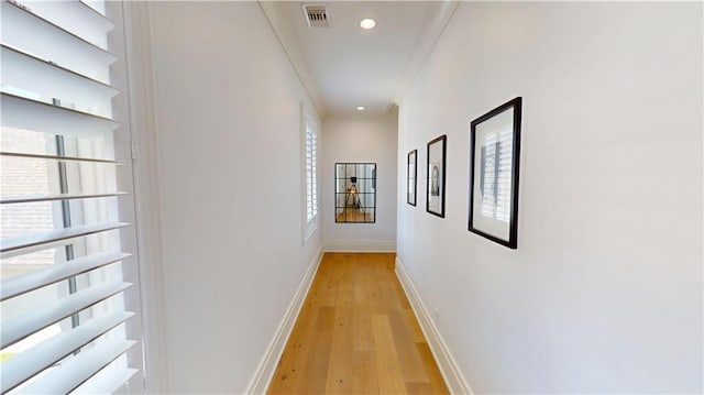 140E Mcgregor Ave S, Mobile, AL 36608 - hall featuring light wood finished floors, baseboards, recessed lighting, and ornamental molding