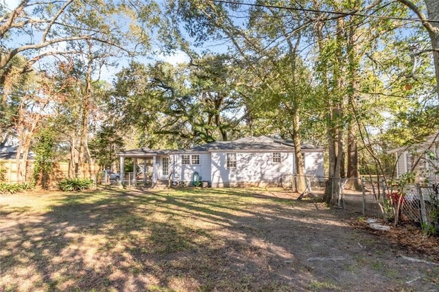 view of yard featuring fence