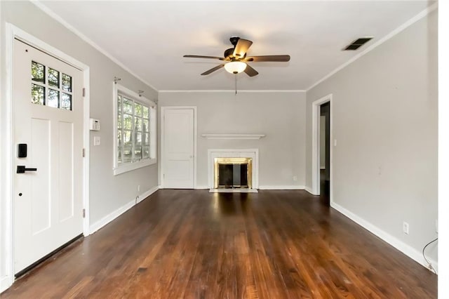 unfurnished living room with visible vents, a fireplace with flush hearth, ornamental molding, wood finished floors, and baseboards