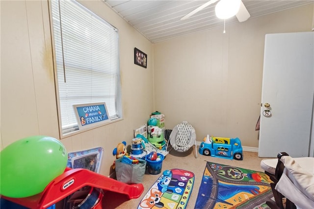 playroom featuring carpet floors and ceiling fan