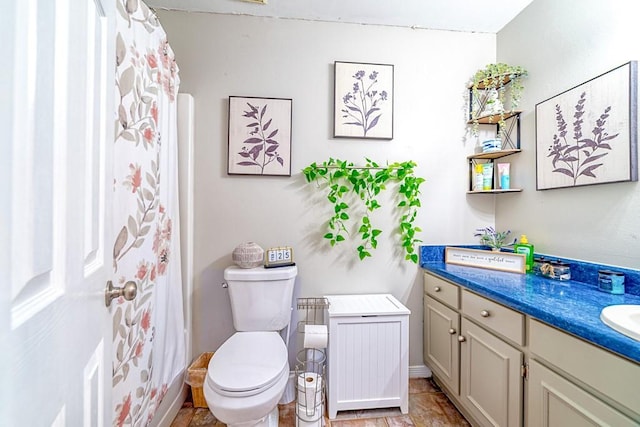 4698 Clarendon Dr, Mobile, AL 36619 - bathroom with toilet and vanity