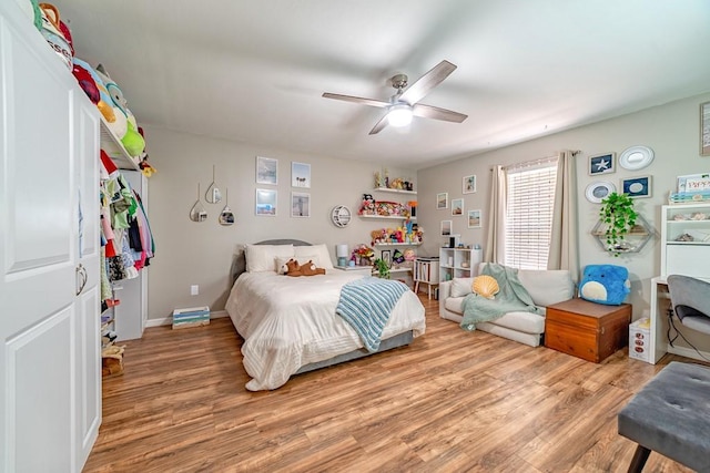 4698 Clarendon Dr, Mobile, AL 36619 - bedroom featuring light wood-style floors, ceiling fan, and baseboards