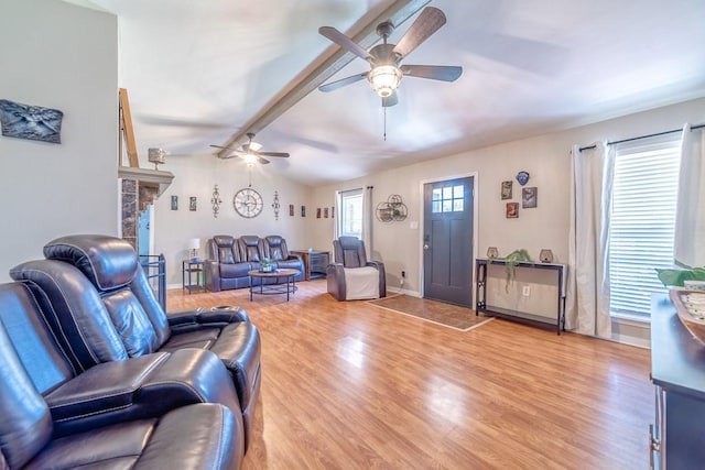 4698 Clarendon Dr, Mobile, AL 36619 - living room featuring lofted ceiling with beams, ceiling fan, light wood-type flooring, and baseboards