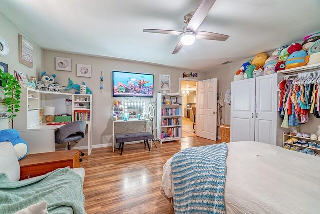 4698 Clarendon Dr, Mobile, AL 36619 - bedroom with visible vents, ceiling fan, baseboards, and wood finished floors