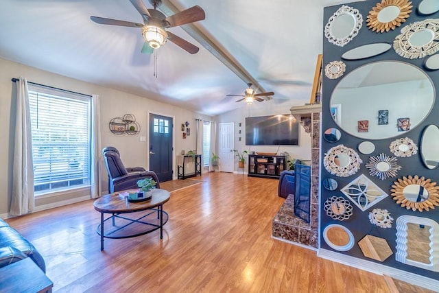 4698 Clarendon Dr, Mobile, AL 36619 - living area featuring lofted ceiling with beams, light wood-style flooring, and baseboards