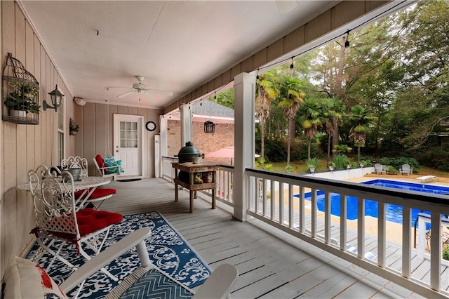 wooden deck with ceiling fan