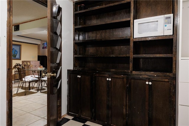 interior space featuring light tile patterned floors