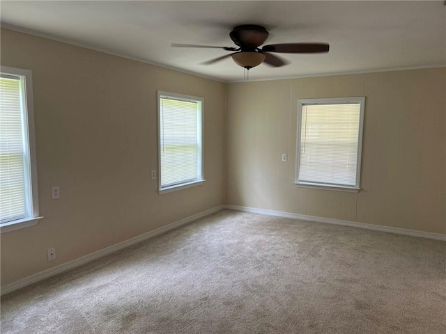 6085 Alice Rd, Semmes, AL 36575 - carpeted spare room with a ceiling fan, ornamental molding, and baseboards