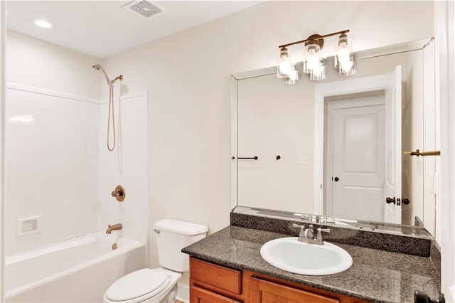 full bathroom with toilet, vanity, and tub / shower combination