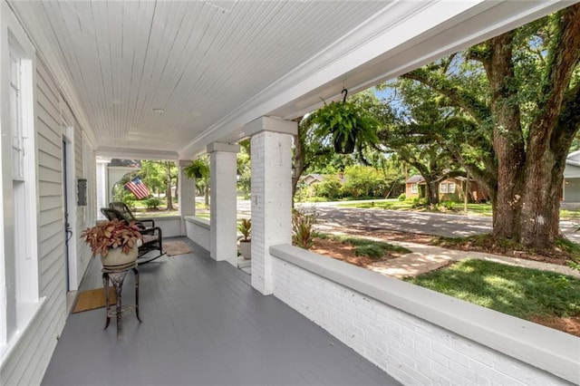 view of patio featuring covered porch