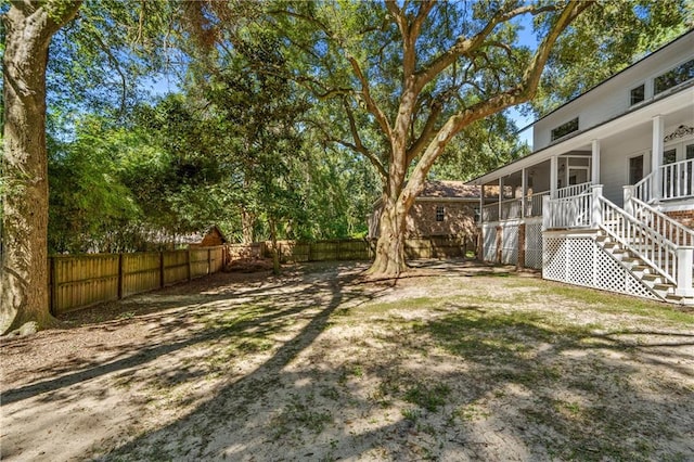 view of yard with a sunroom