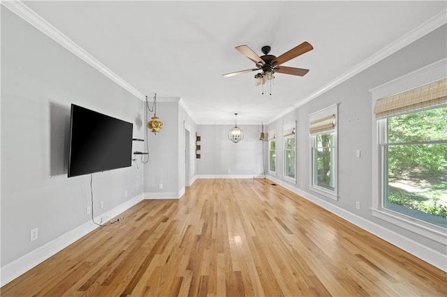 unfurnished living room with light wood-type flooring, ornamental molding, and ceiling fan