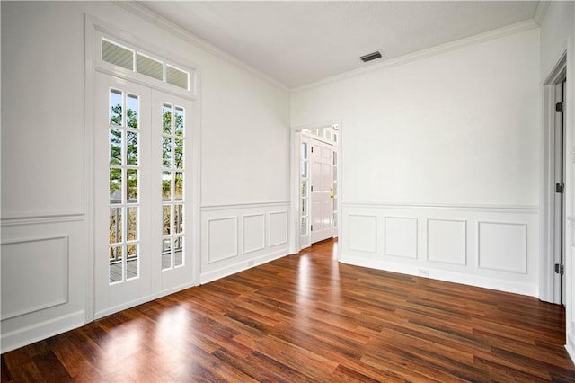 unfurnished room with crown molding and dark wood-type flooring